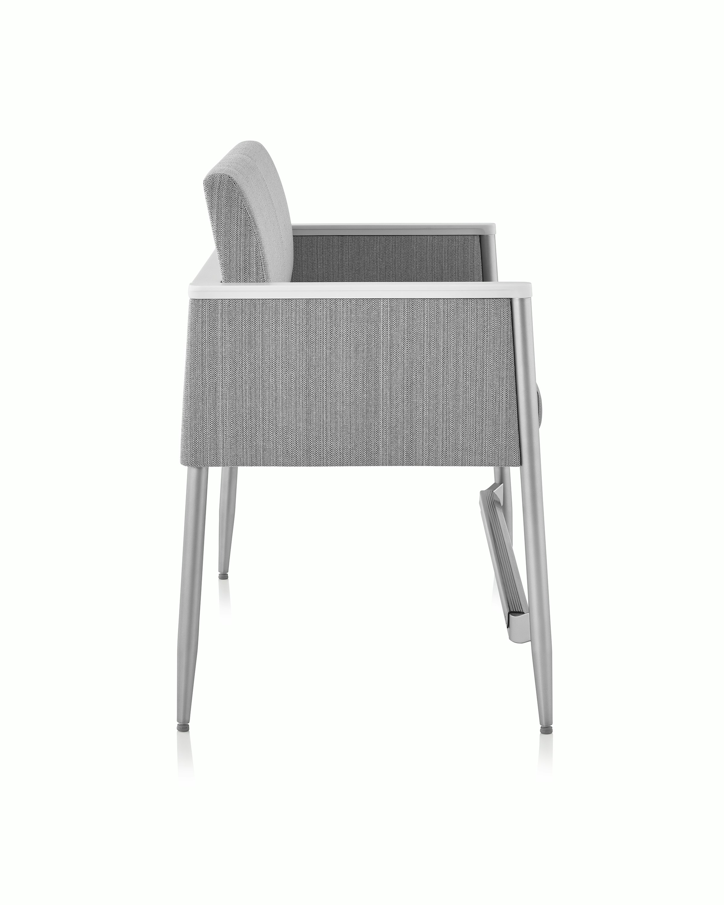 Nemschoff Palisade Easy Access Multiple Seating in a gray upholstery and white arm caps, viewed from the side.