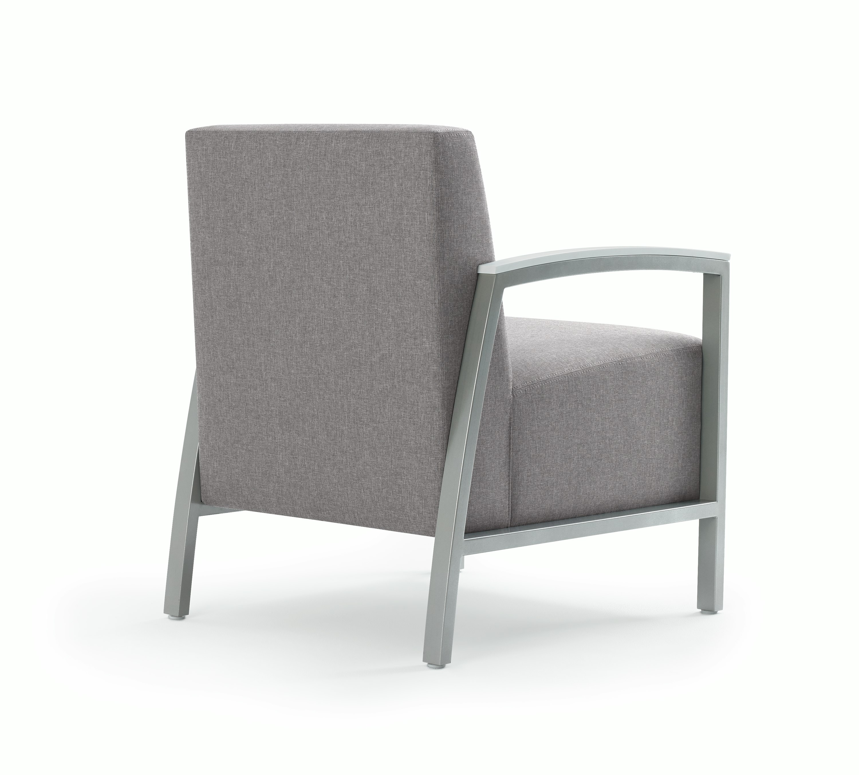 Back three-quarter view of Brava Modern Lounge Seating (chair) with solid surface arm caps.