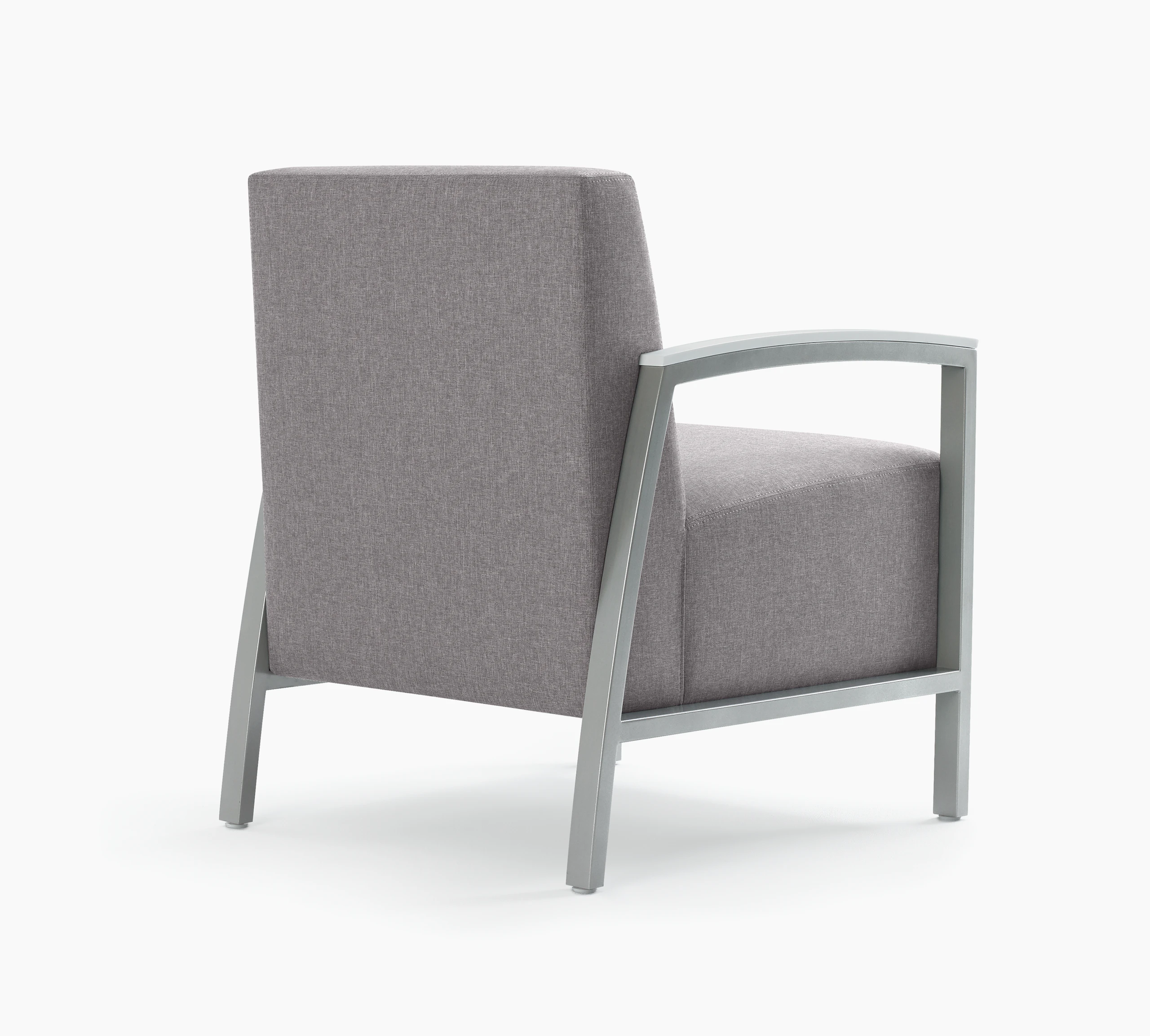 Back three-quarter view of Brava Modern Lounge Seating (chair) with solid surface arm caps.