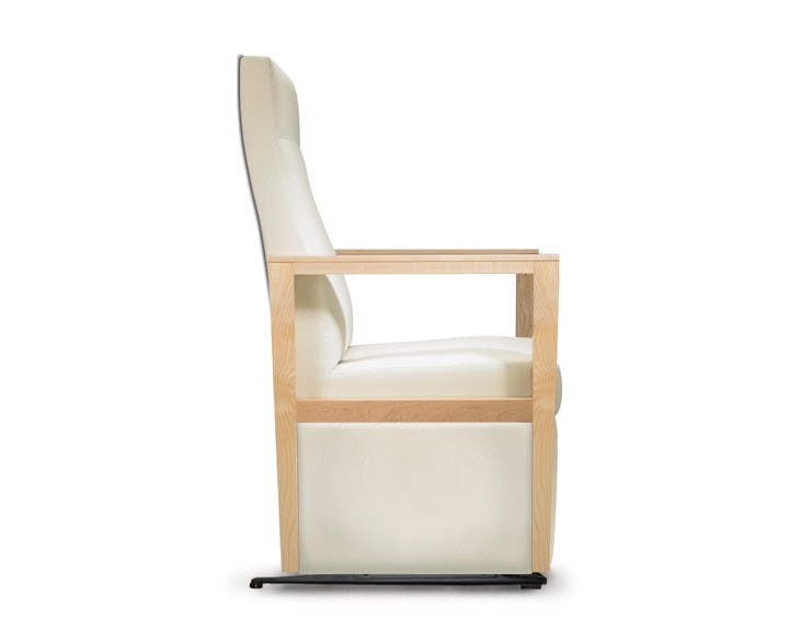 A side view of a Brava Glider with high back in white textile with open maple wood arms.