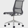 Rear angle view of a Setu chair without arms in grey.