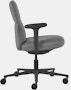 Side view of a mid-back Asari chair by Herman Miller in dark grey with height adjustable arms.