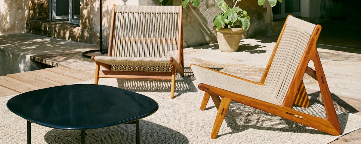 MR01 Initial Outdoor Lounge Chairs in an outdoor patio setting