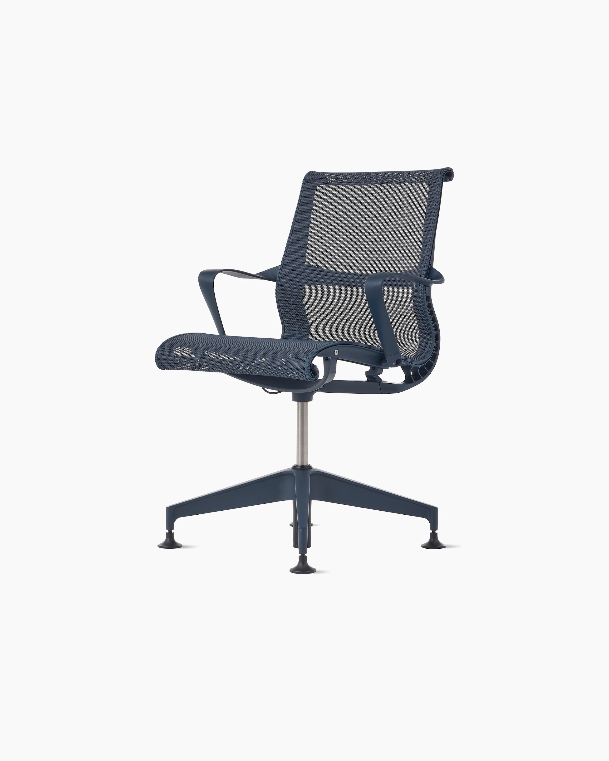 Front angle view of a Setu side chair with fixed arms in dark blue.