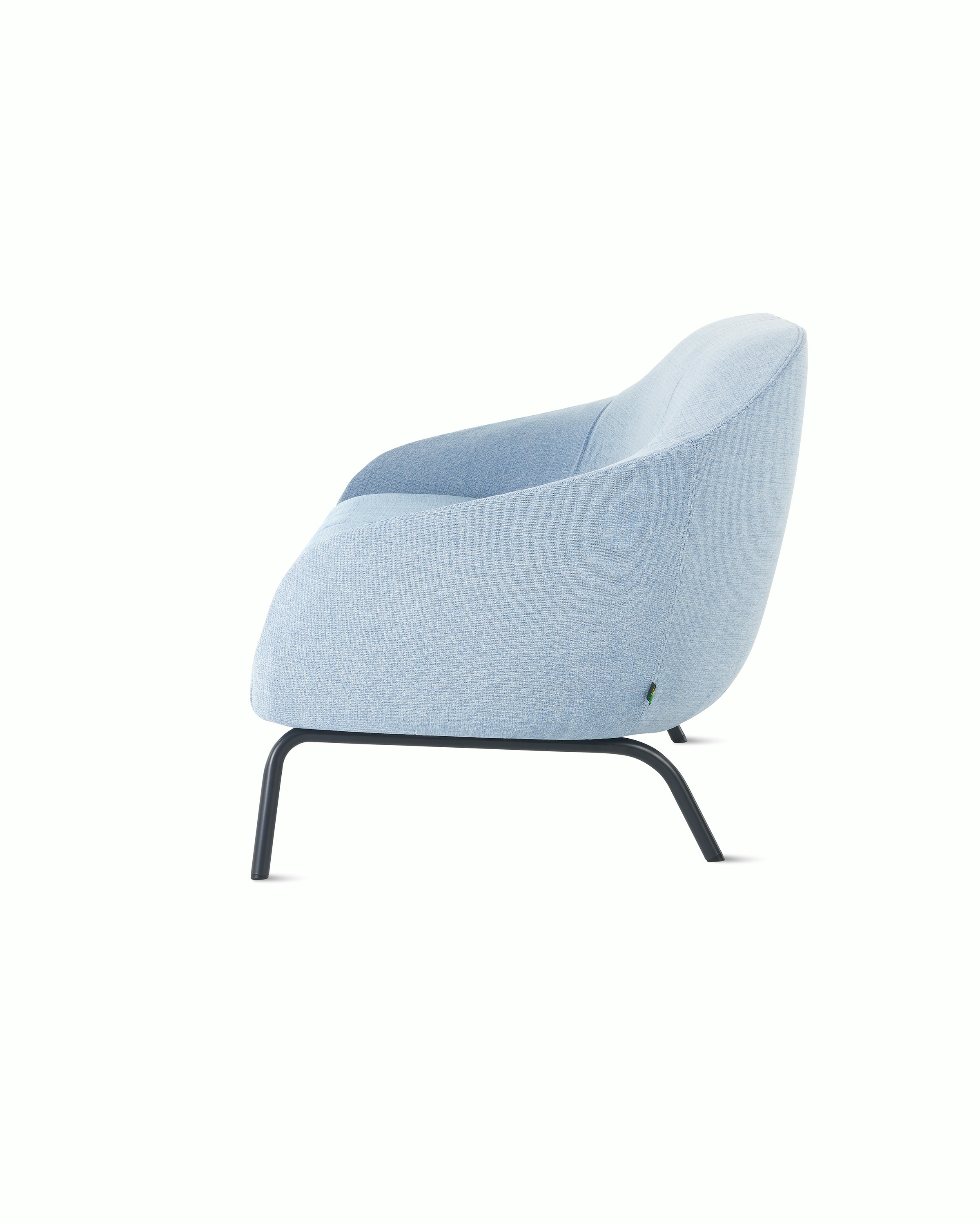 White sweep shot of pastel blue upholstered Ever 2 seat sofa on black steel legs.