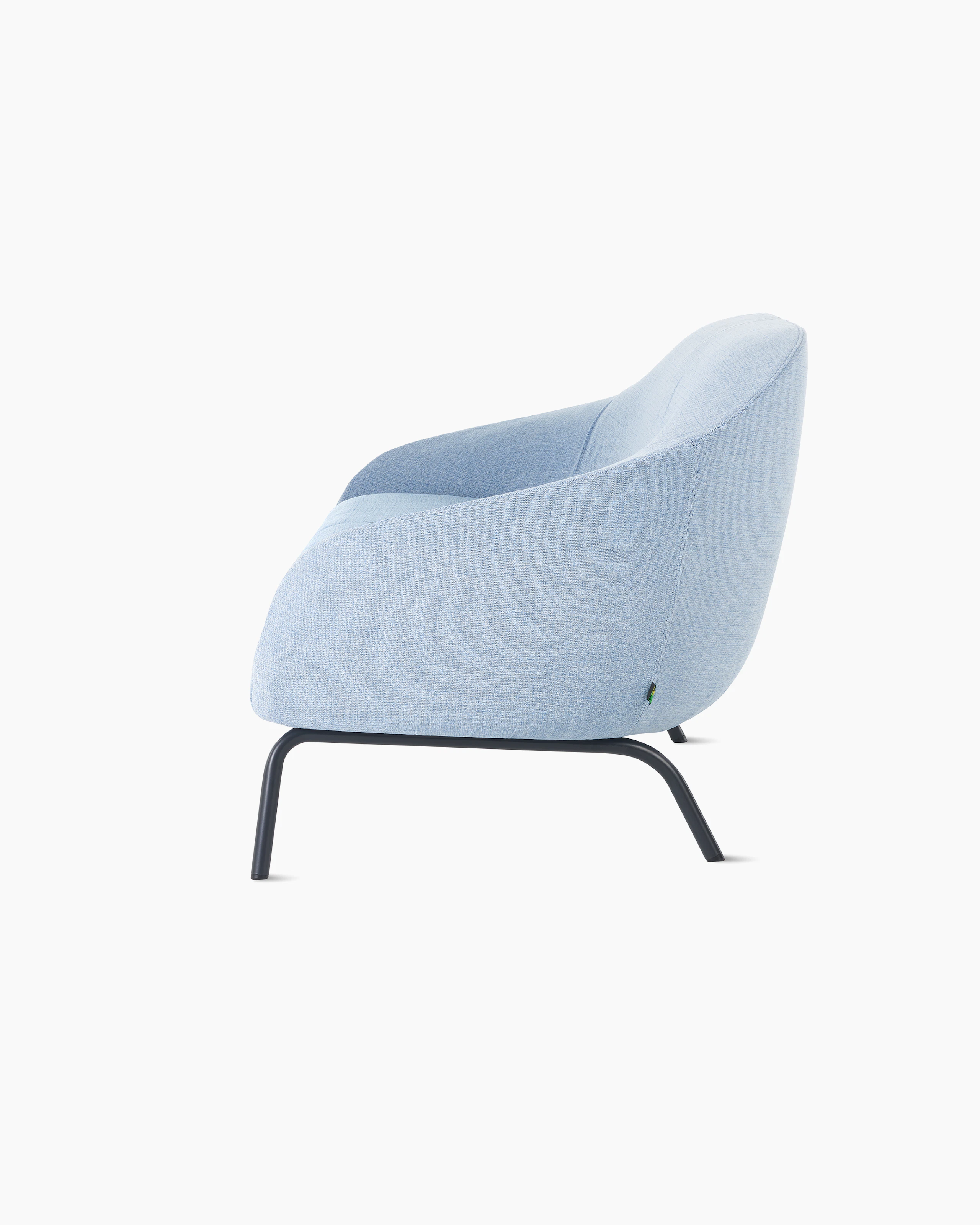 White sweep shot of pastel blue upholstered Ever 2 seat sofa on black steel legs.