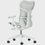 Rear angle view of a Mirra 2 chair with a Butterfly back in alpine and a silver alloy base.