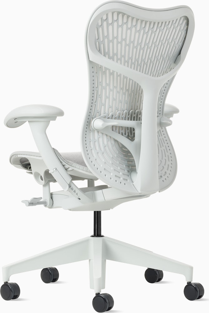 Rear angle view of a Mirra 2 chair with a Butterfly back in alpine and a silver alloy base.