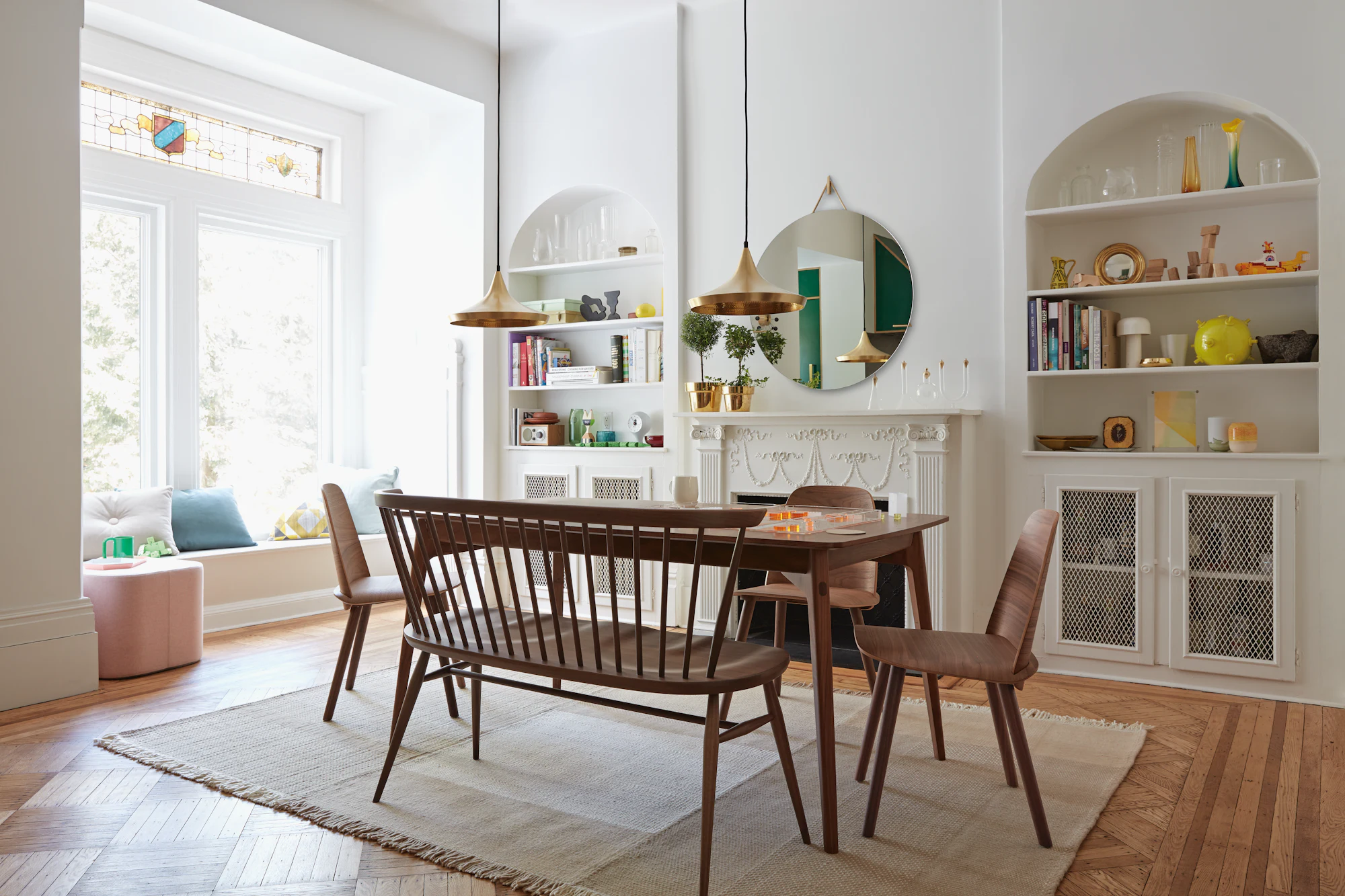 Nerd Chair-style molded wood dining chair with upholstered seat in light brown.