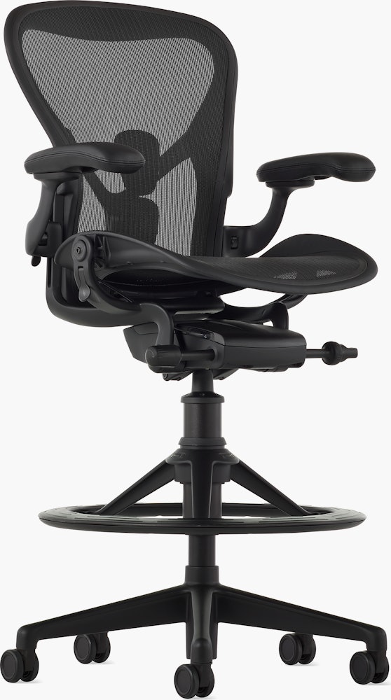 Black matte Aeron Stool on a white background with a 5-star base and ergonomic back support, angled view of the stool front.