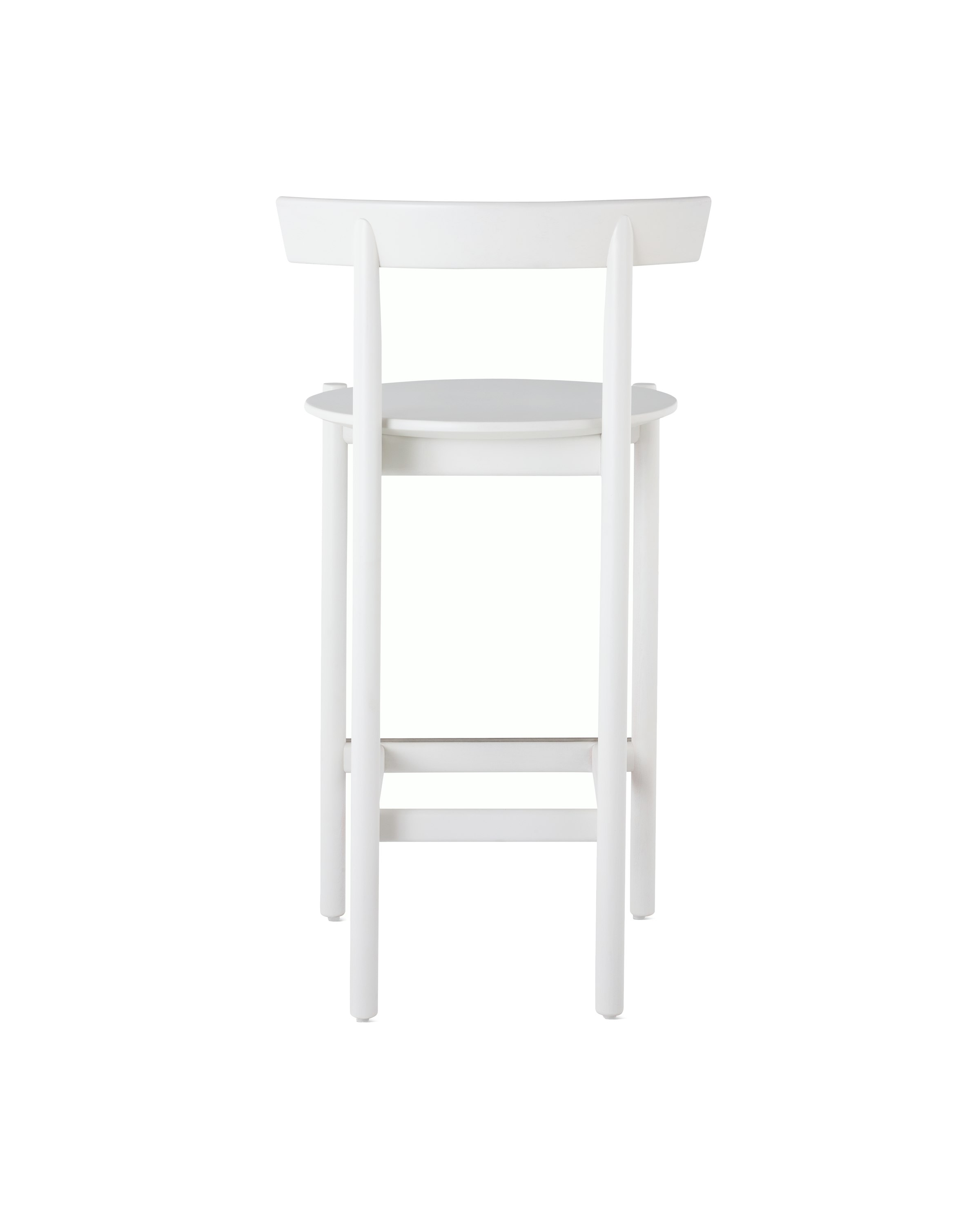 A white counter-height Comma Stool, viewed from the back.