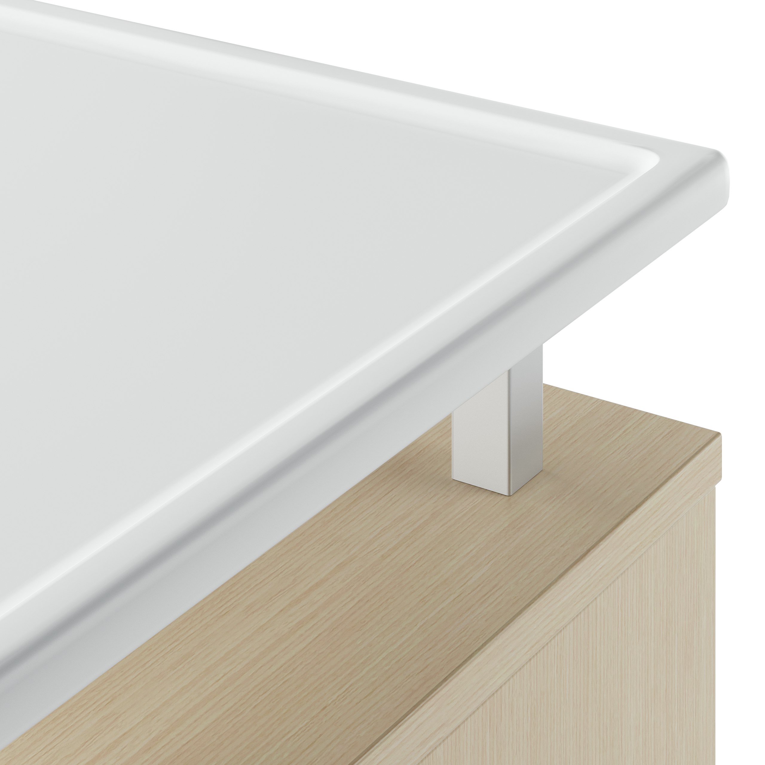 A detail of the Nemschoff Bedside Cabinet raised top in a white Corian on an ash laminate cabinet.