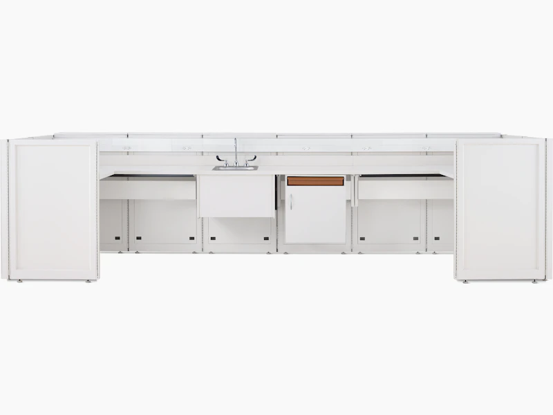 Co/Struc System laboratory bench in soft white with under surface storage and sink.