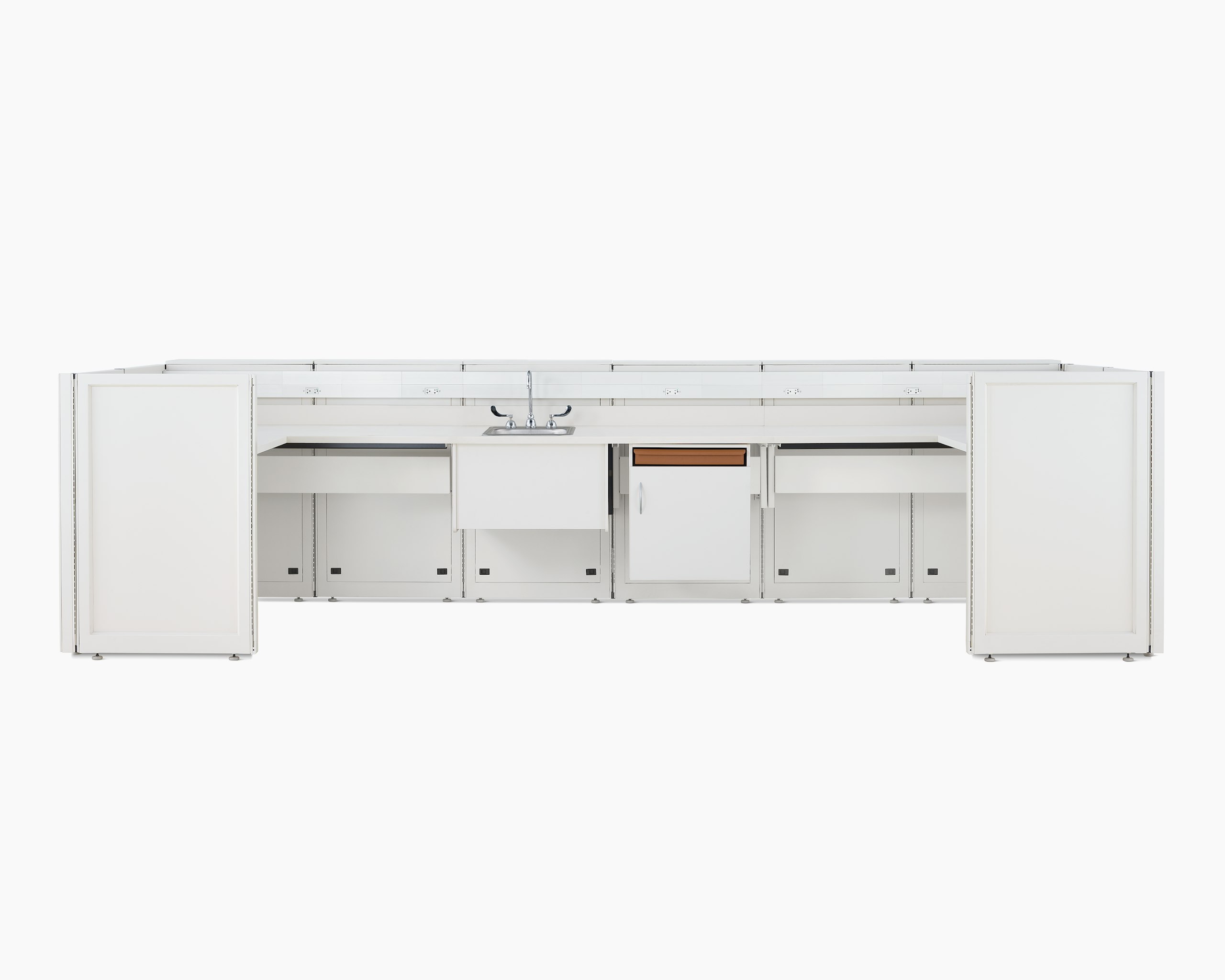 Co/Struc System laboratory bench in soft white with under surface storage and sink.