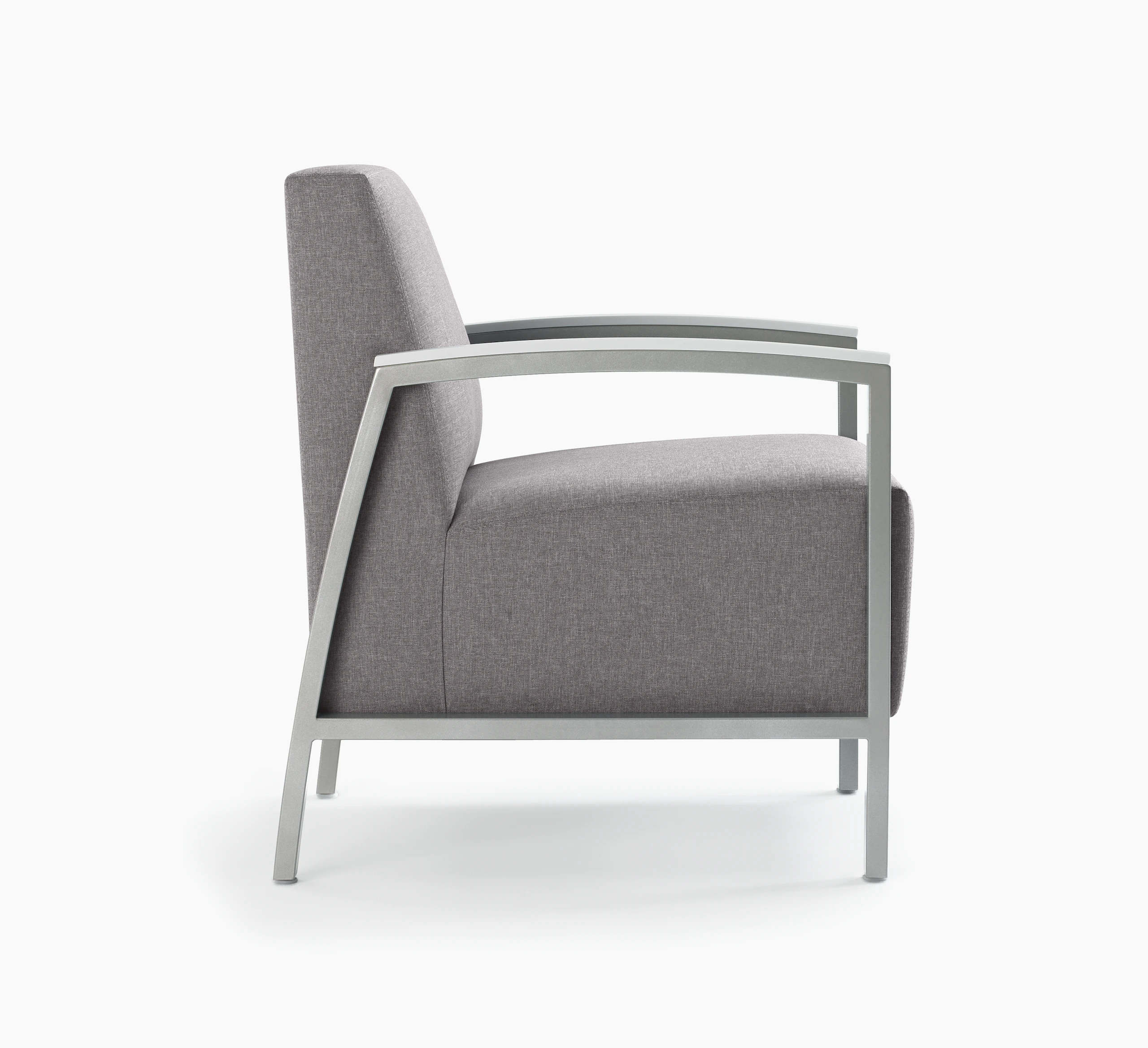 Side view of Brava Modern Lounge Seating (chair) with solid surface arm caps.