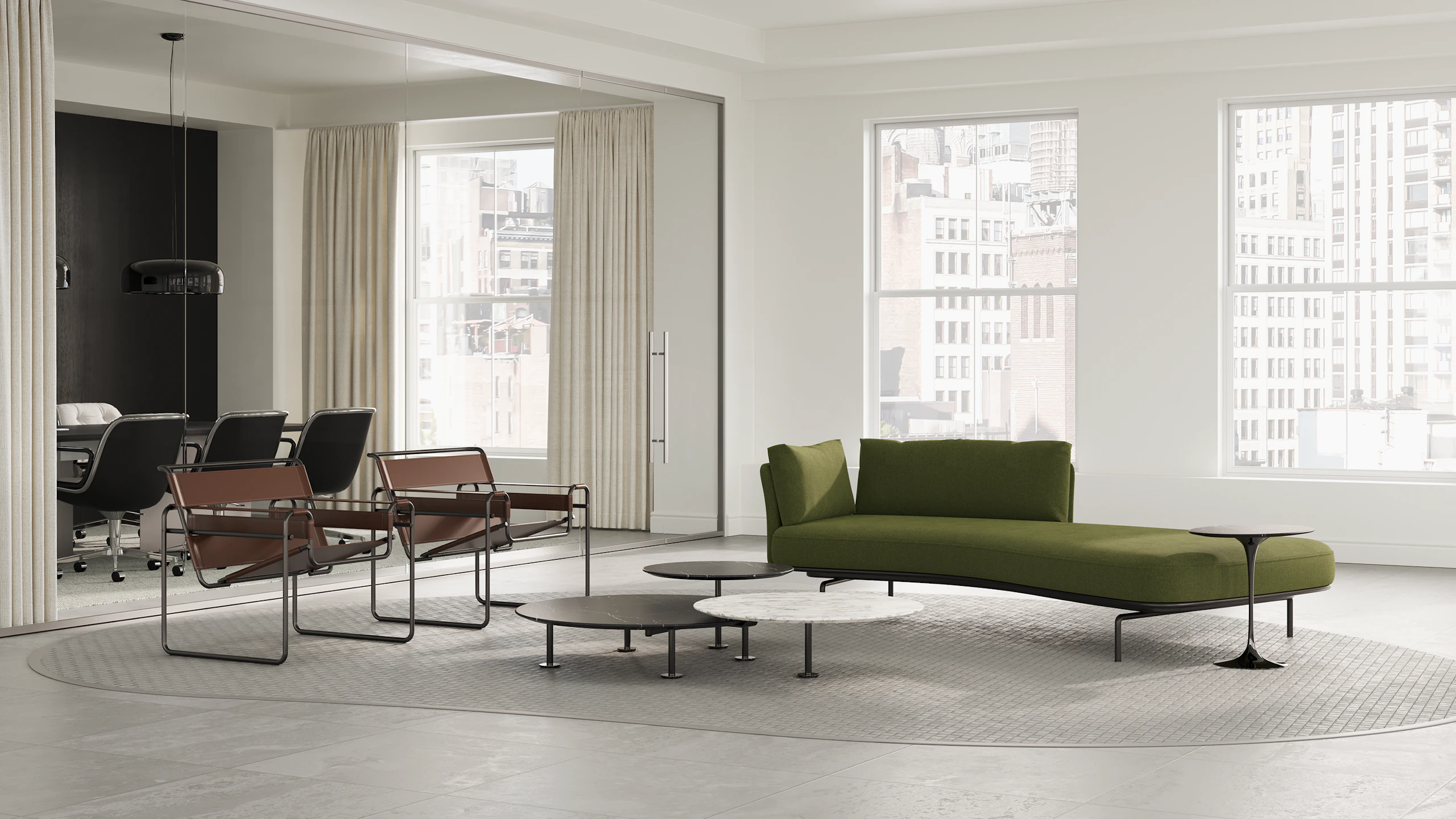 A private office with a lounge setting consisting of a Panoramic Sofa, two Wassily Chairs and Grasshopper tables set
