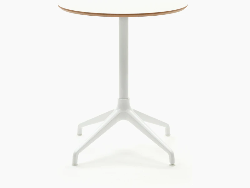 Ali Dining Table with white 4 star base and white mfmdf circular table top.