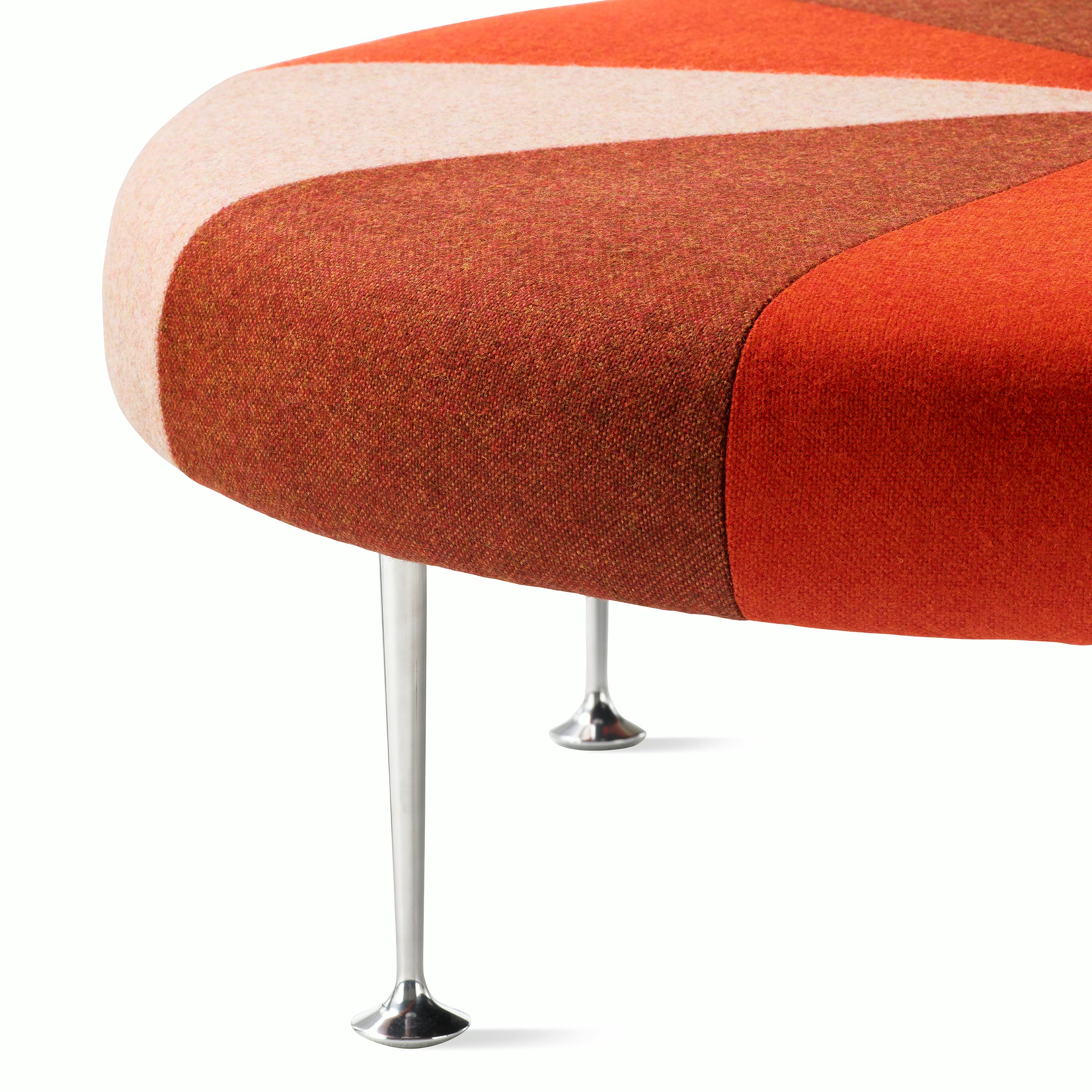 A close up detail of the legs of a Girard Color Wheel Ottoman.