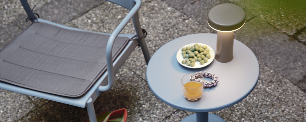 Linear Steel Lounge Chair Seat Pad and Chair in a patio setting