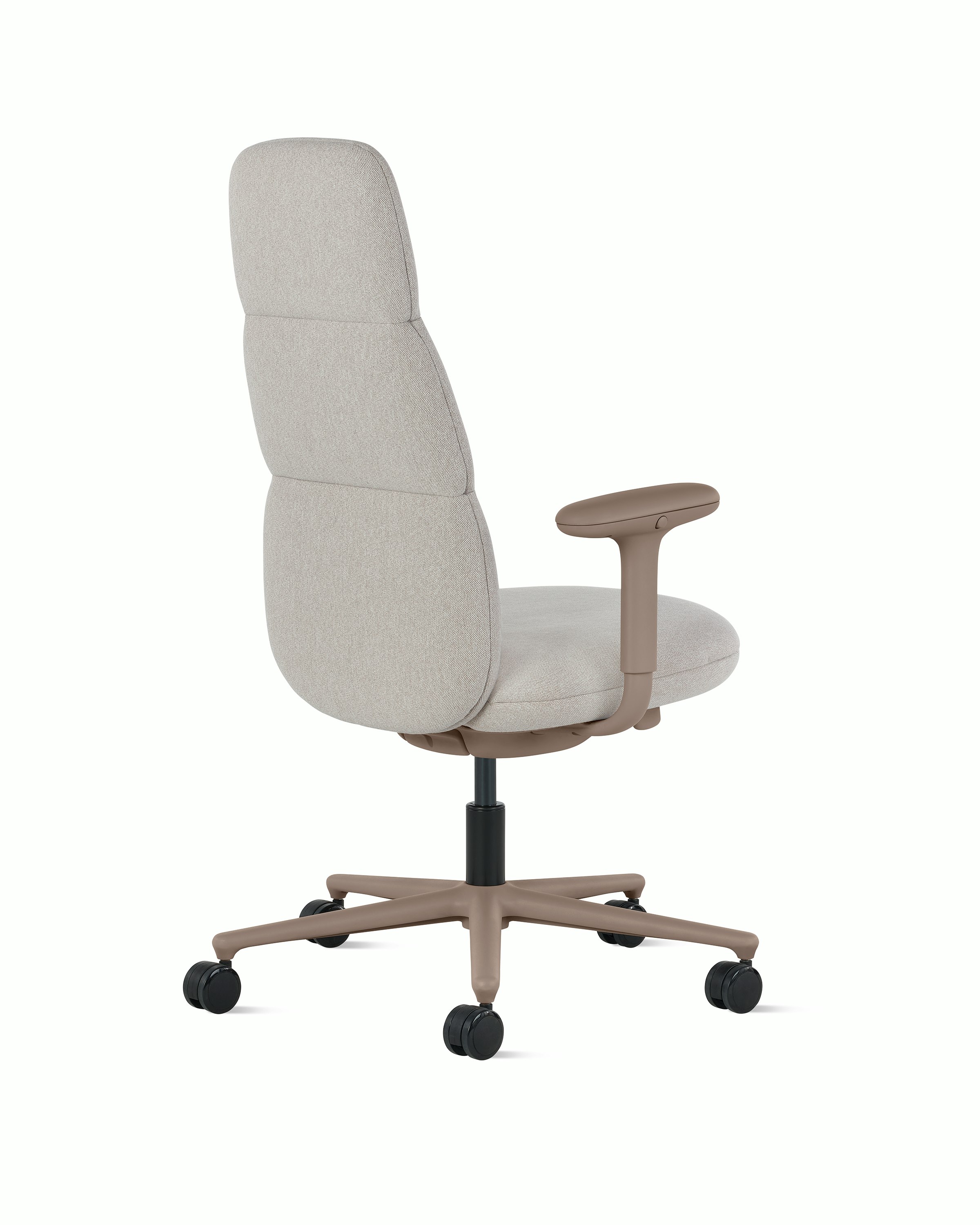 Rear angle view of a high-back Asari chair by Herman Miller in light brown with height adjustable arms.