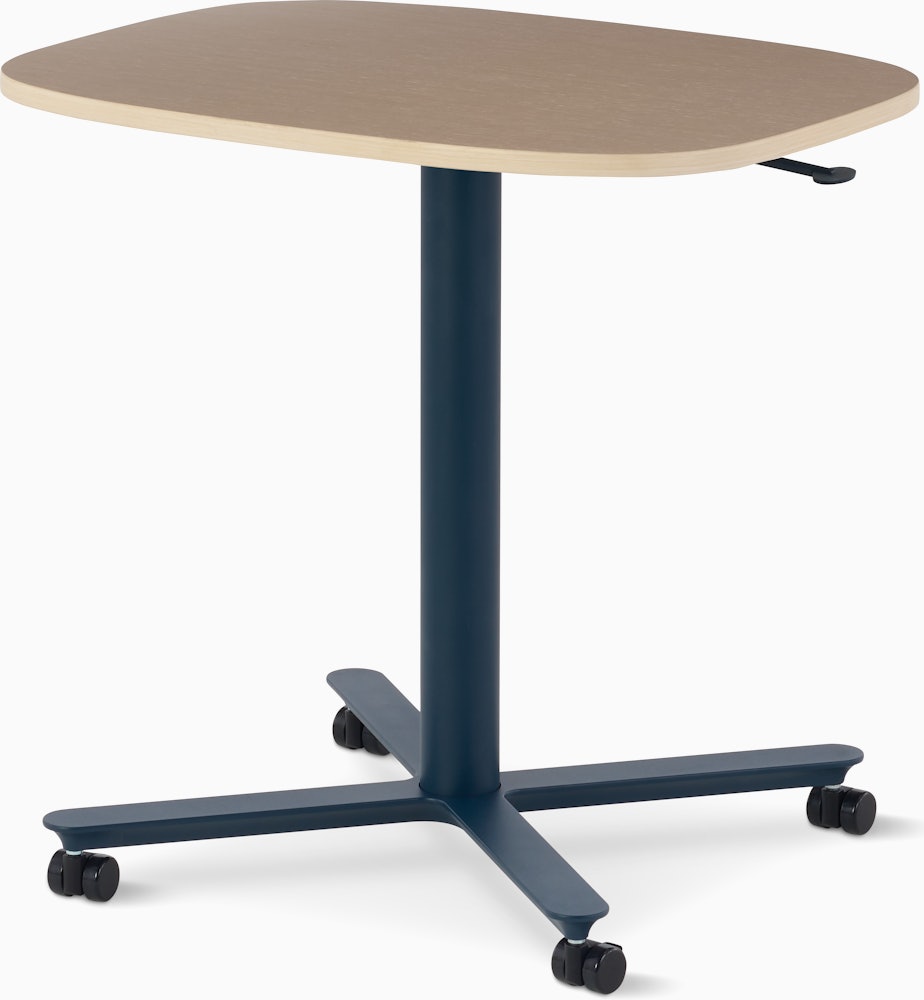 Large Passport Work Table with light woodgrain surface and dark blue base on casters.