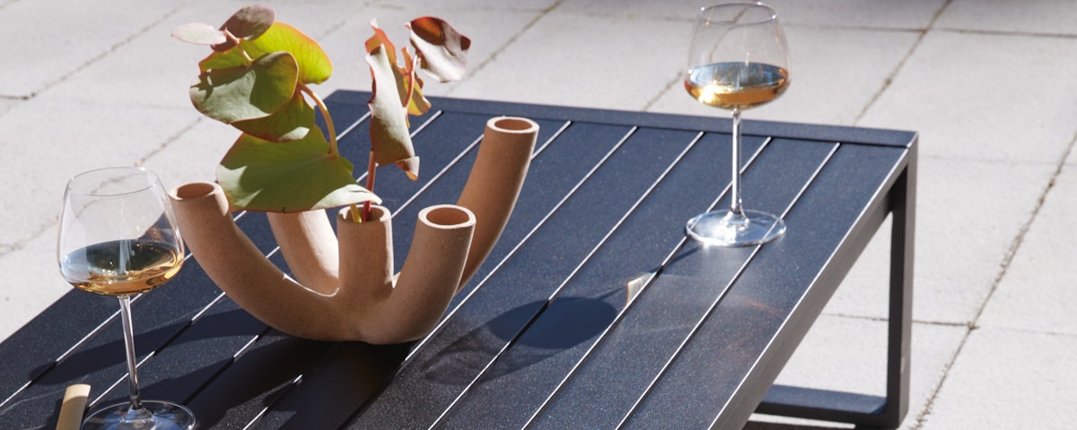 Mirage Stemware White Wine Glasses on an Eos Outdoor Coffee Table