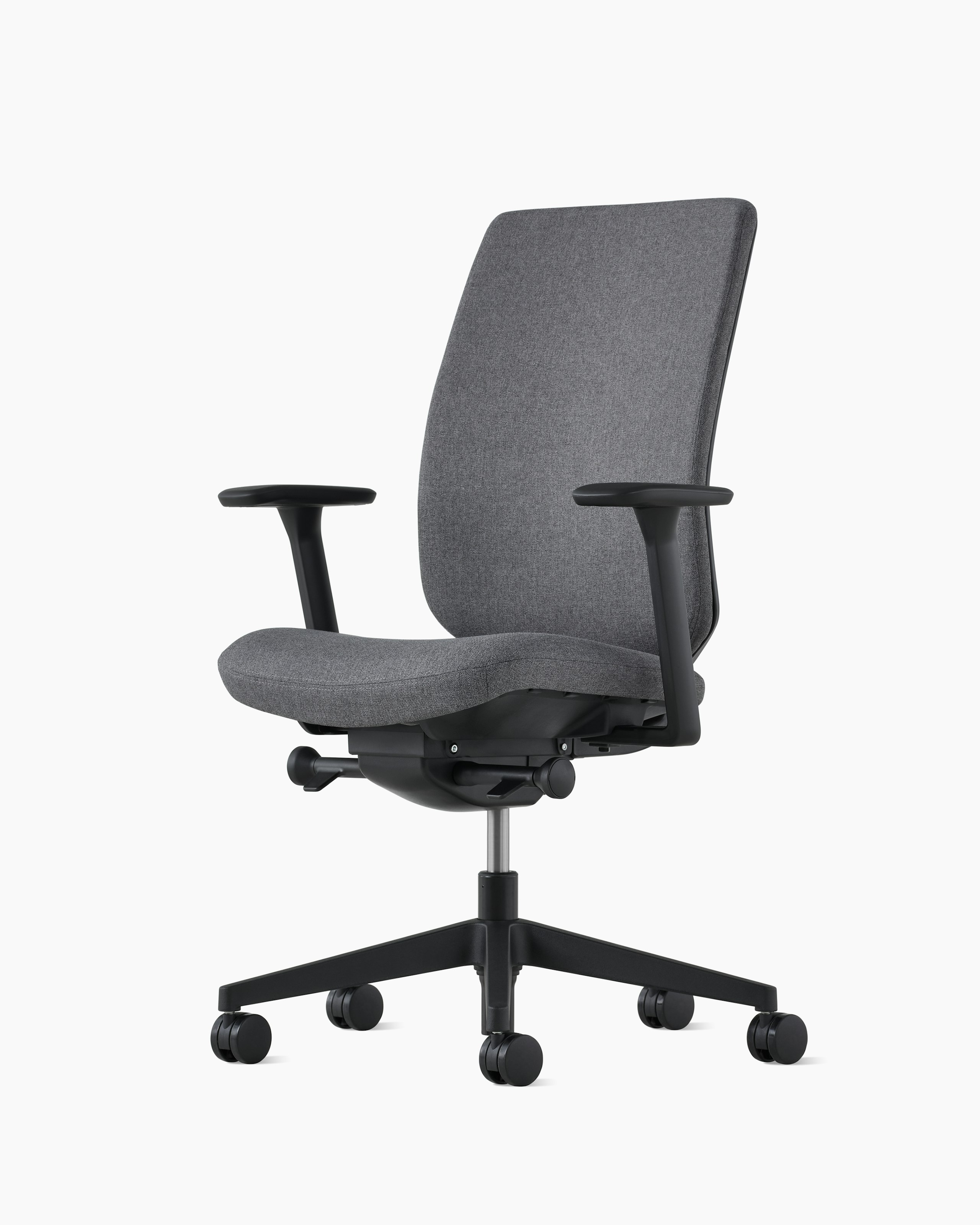 A dark grey Verus Chair with an upholstered back, viewed at an angle.