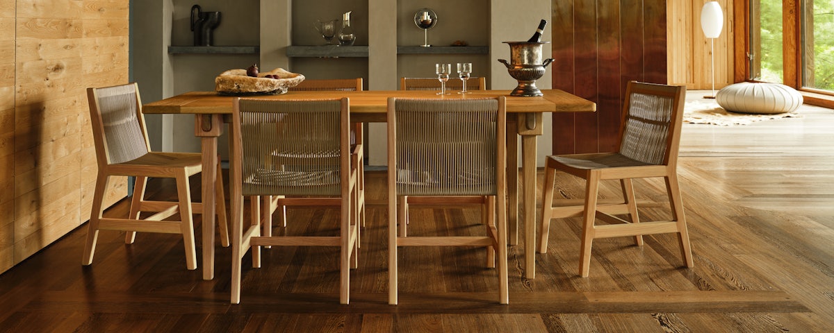 Tobala Dining Table with Duet Chairs in a dining room setting