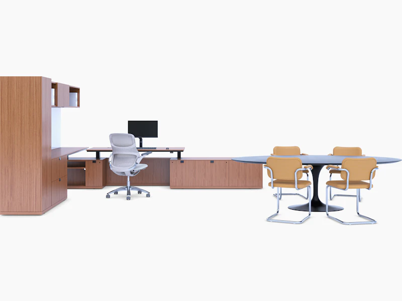 A multi-use private office featuring light brown woodgrain veneer, white backpainted glass workwall, a height-adjustable table and task chair.