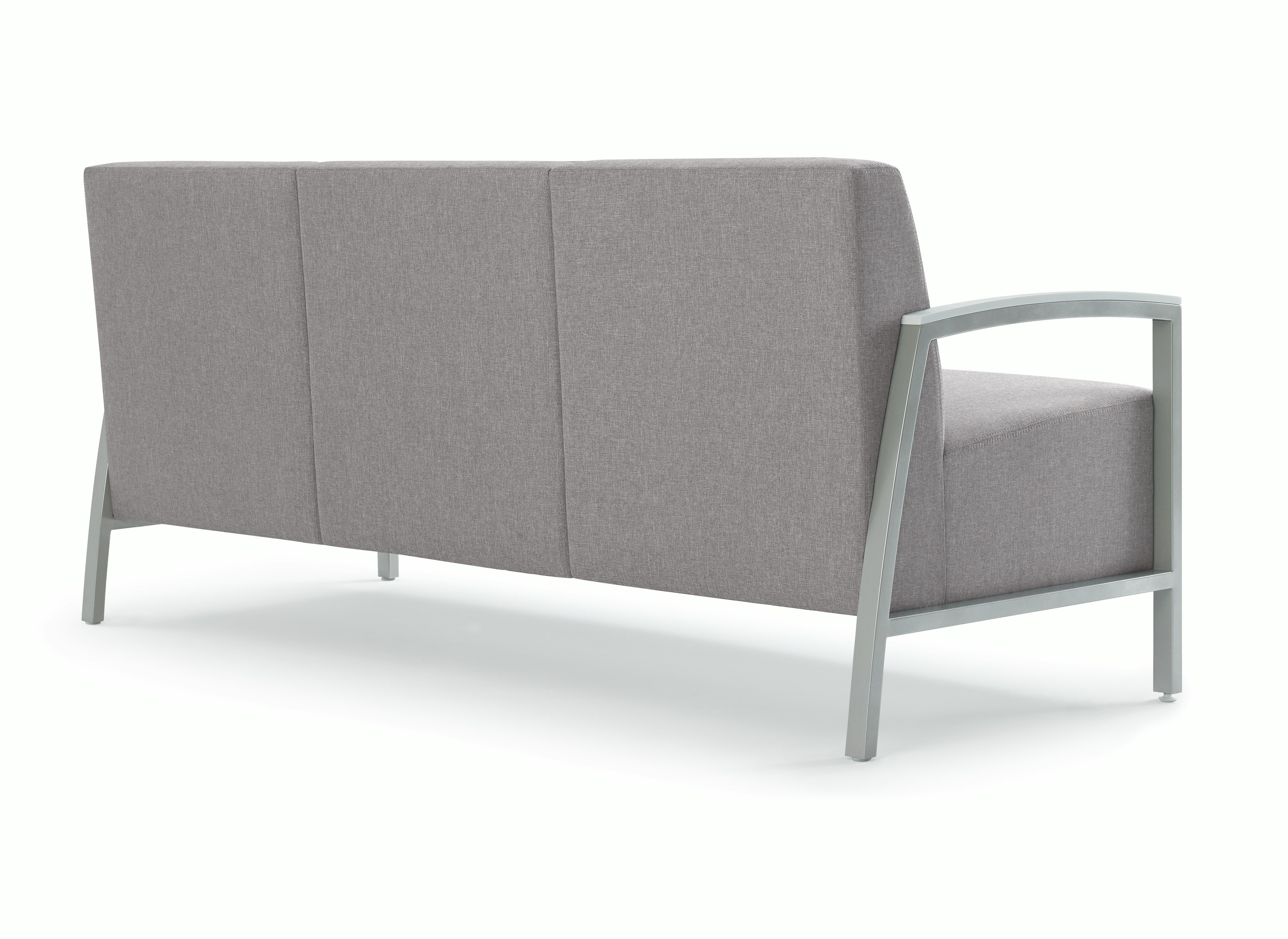 Back three-quarter view of Brava Modern Lounge Seating (three seat) with solid surface arm caps.