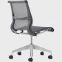 Rear angle view of a Setu chair without arms in grey.