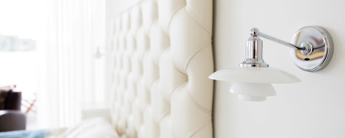 PH 2/1 Wall Lamp at a bedside setting