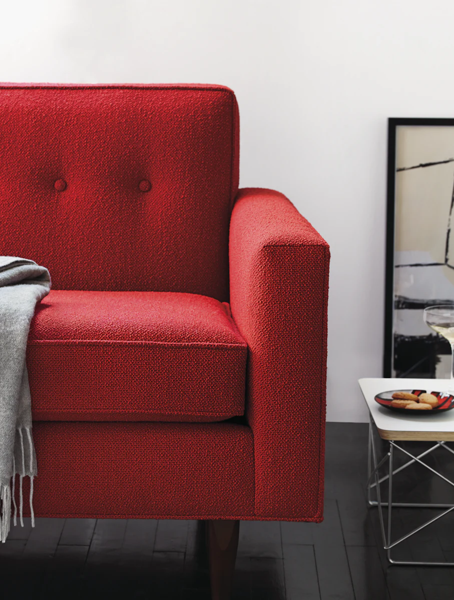 Red Bantam armchair with button tufting