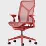 A canyon mid-back Cosm Chair with height adjustable arms.
