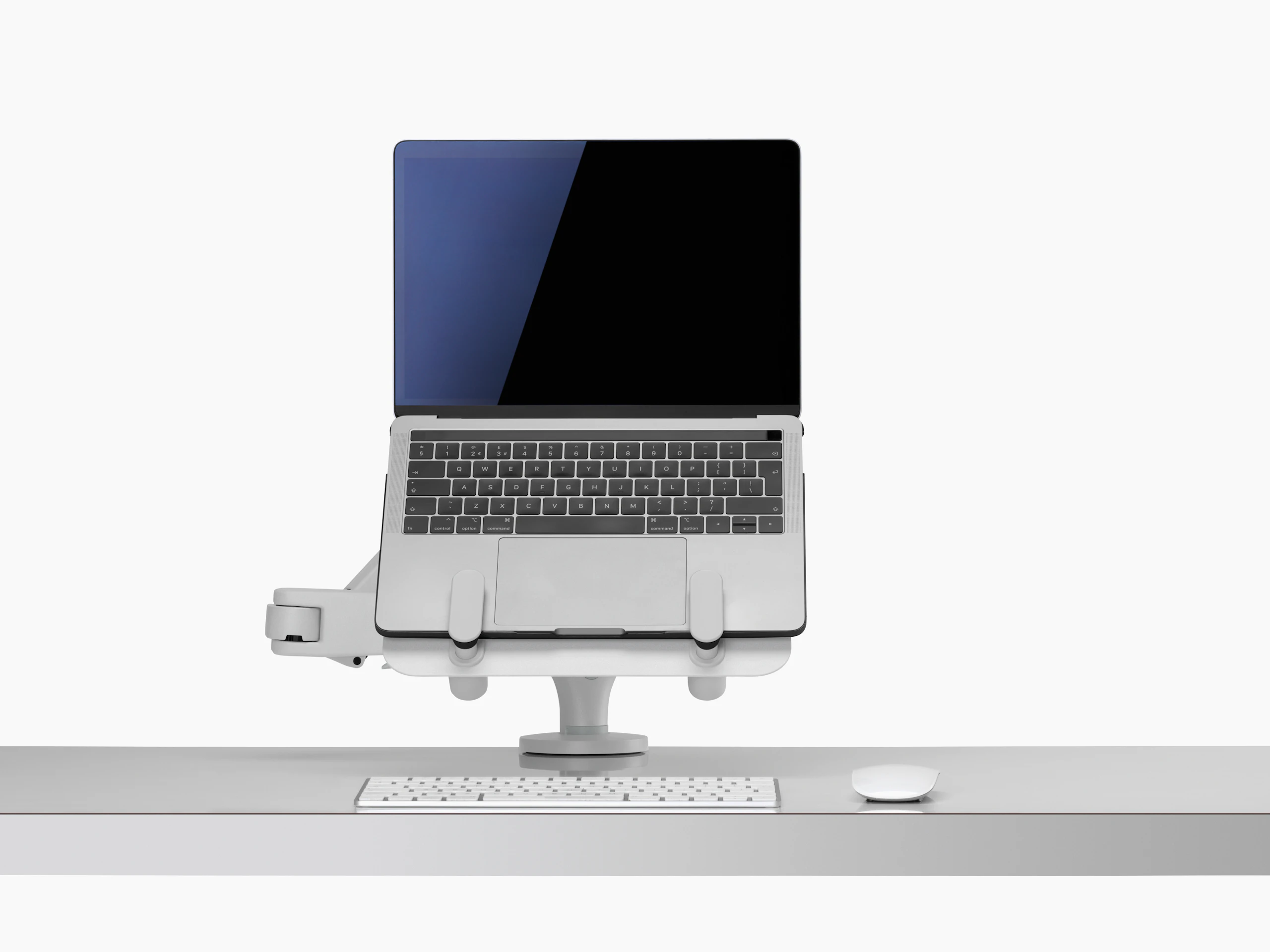 Front view of an open laptop raised and supported by an Ollin Laptop and Tablet Mount connected to an Ollin Monitor Arm.