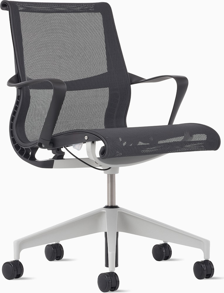 Front angle view of a Setu chair in dark grey with a silver alloy base.