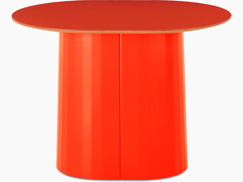 White sweep shot of Tun Low Side Table with orange metal base and orange Forbo table top.
