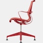 Side  view of a Setu side chair with fixed arms in red.