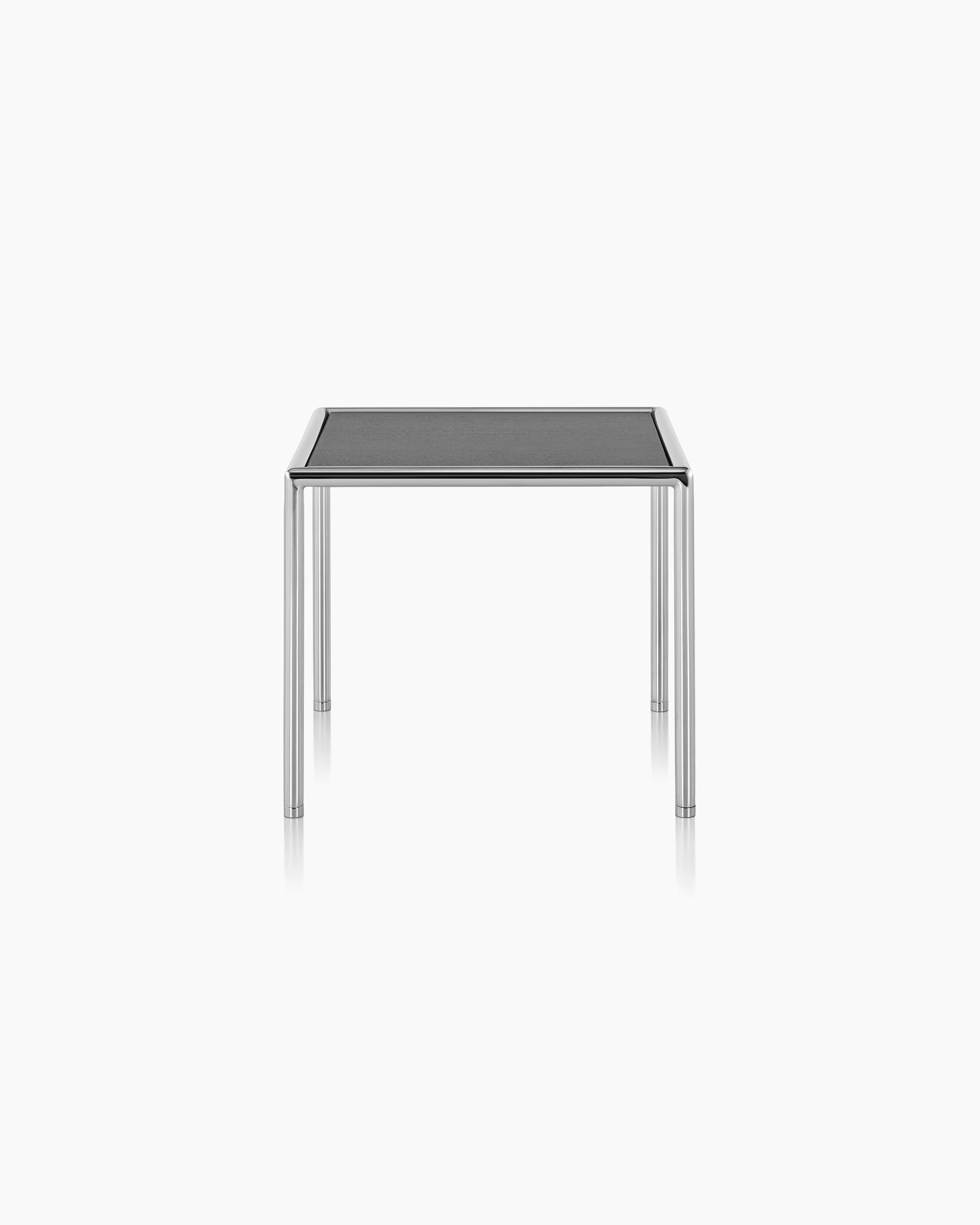 A square Full Round side table with a black wood top and tubular metal frame.