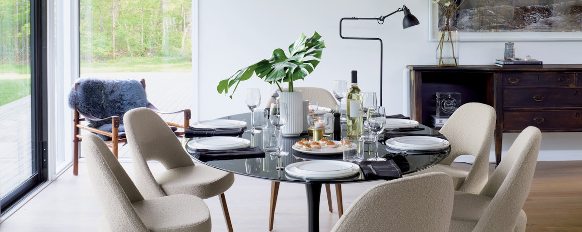 Lampe Gras Model N411 Floor Lamp, Saarinen Dining Table, and Saarinen Dining Chairs in a dining room setting