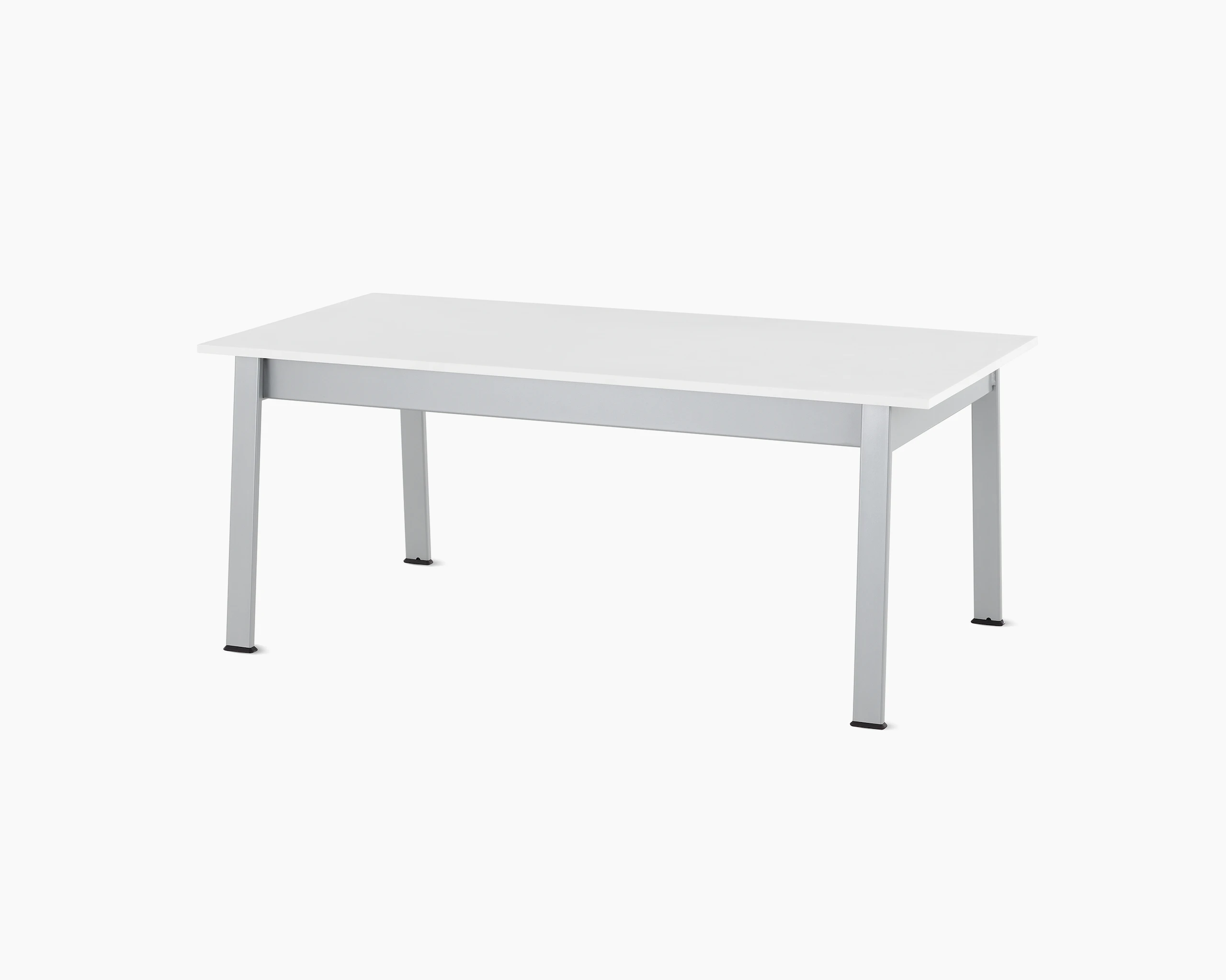 Angled view of an Easton Coffee Table with a glacier white Corian top and metallic silver legs.
