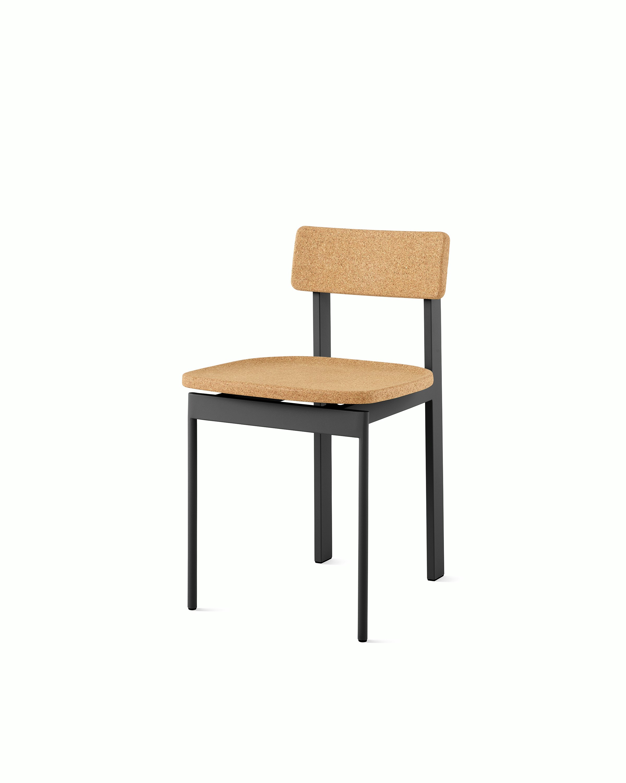 A cork Betwixt Chair with a black frame. 