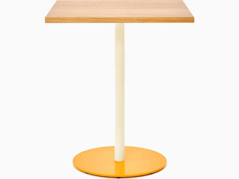 Front view of a square Tier table with Oak veneer top, Oyster stem and Broom Yellow base.