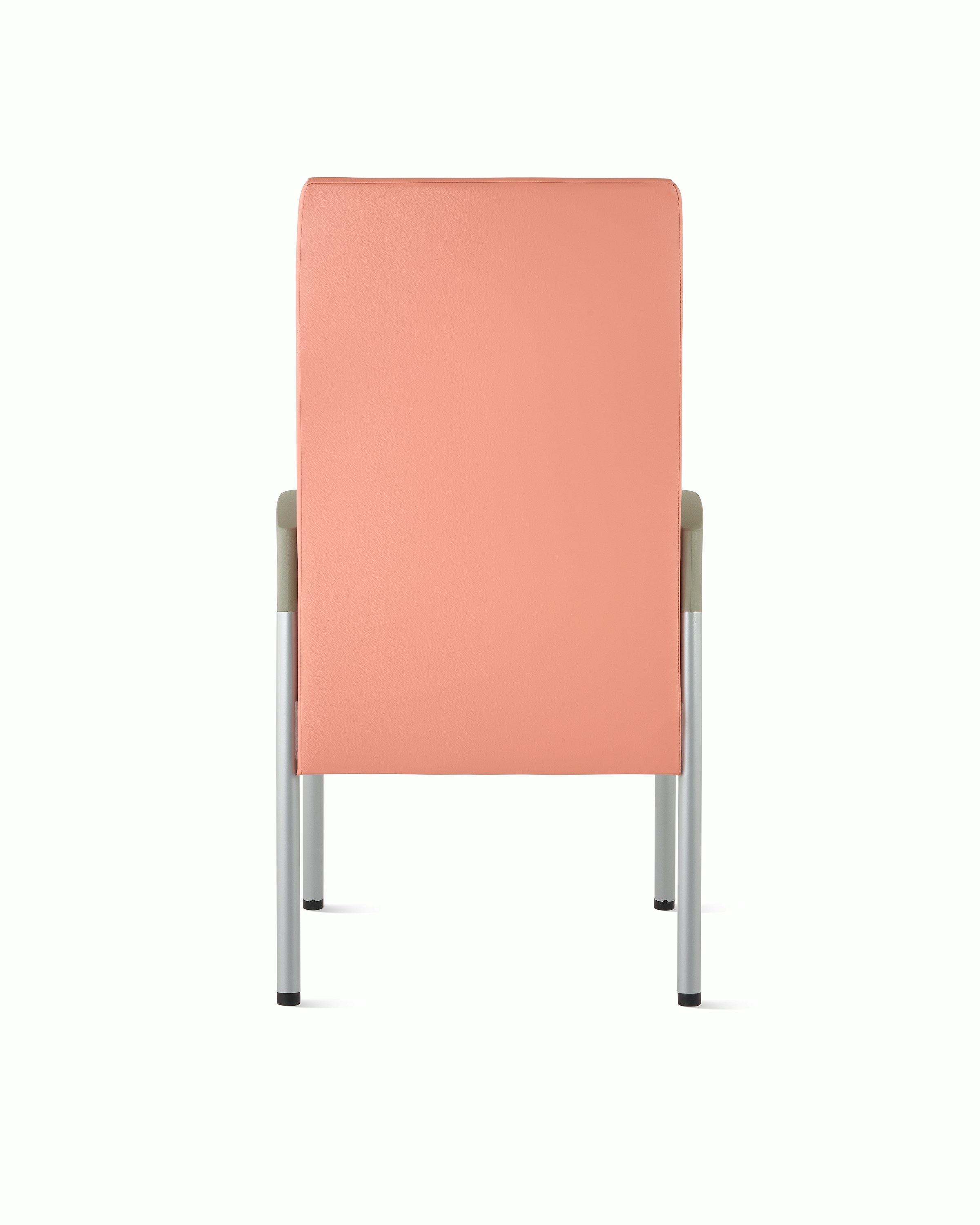 Back view of a high-back Valor patient chair in a salmon upholstery and silver frame with pewter armcaps.