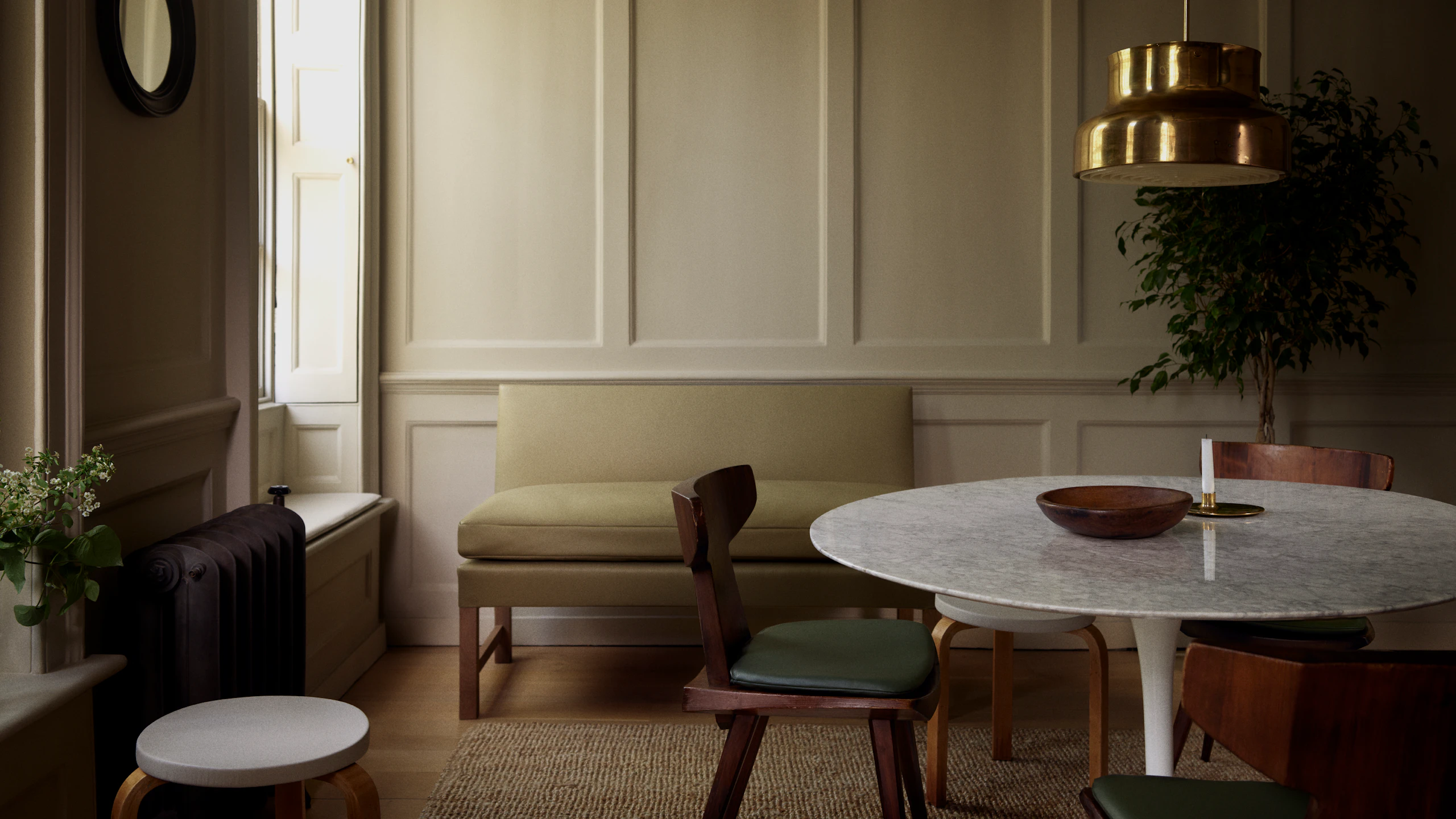 A sunlit dining space featuring furniture showcasing Edelman leather