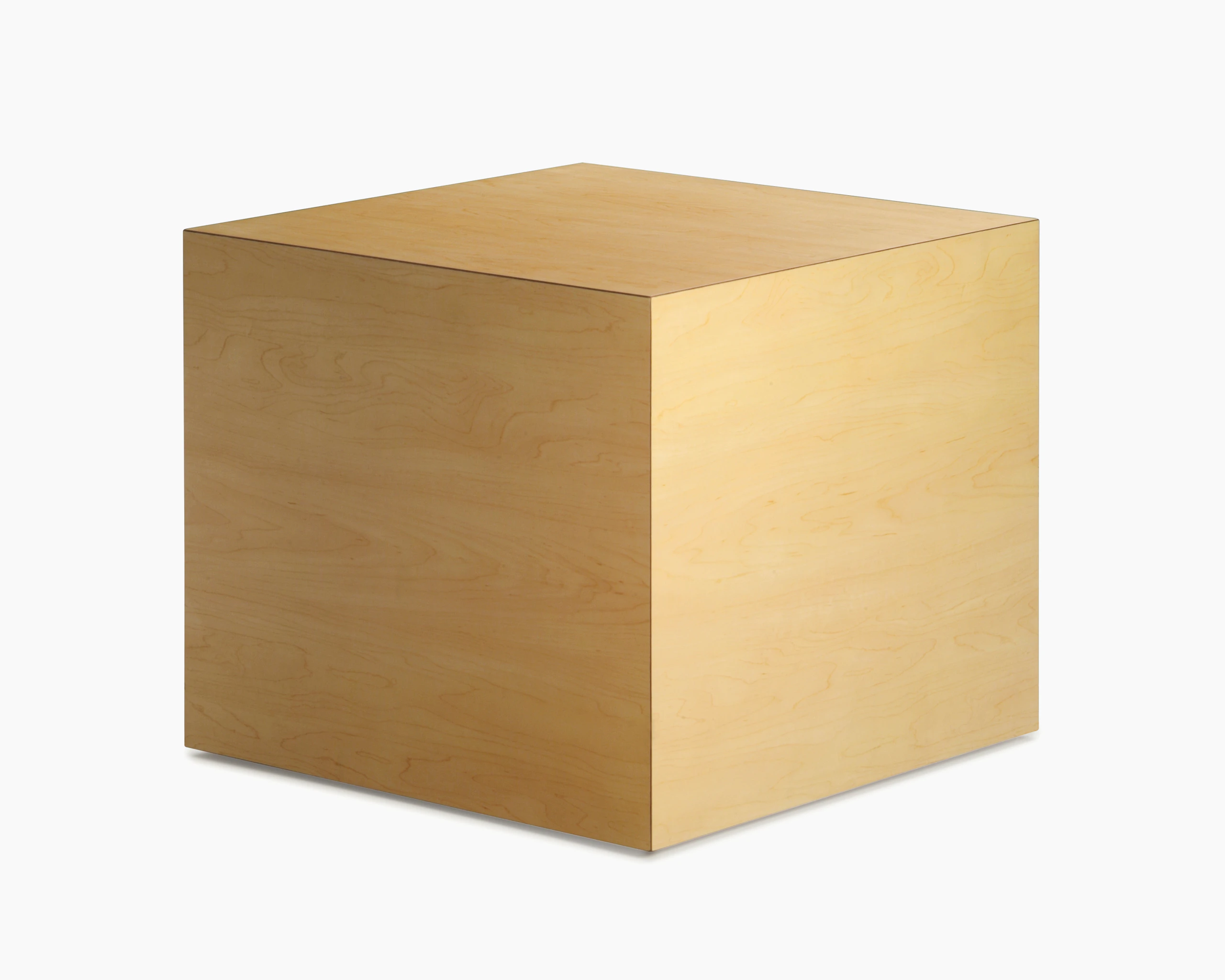 Cube Table in a honey maple finish viewed at an angle.