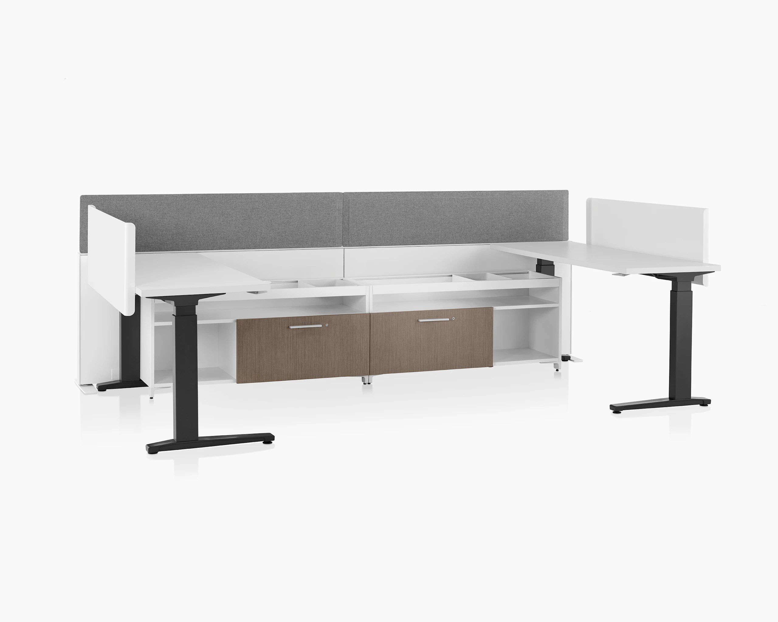 White Canvas Channel with lower storage, gray screens, and Motia Sit-to-Stand Tables with white surfaces, screens, and black legs