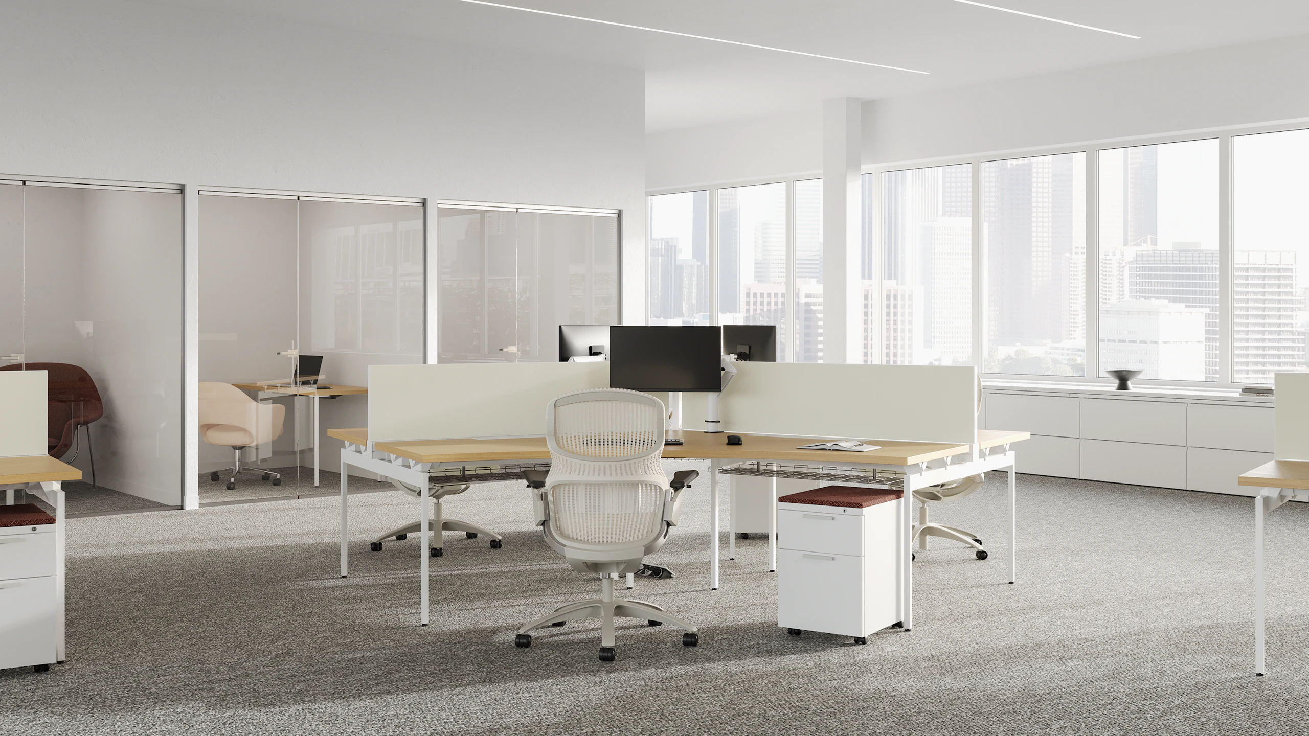 White and brown Antenna Big Table in a 120 degree configuration, with white Generation Chairs and white Series 2 mobile pedestals.