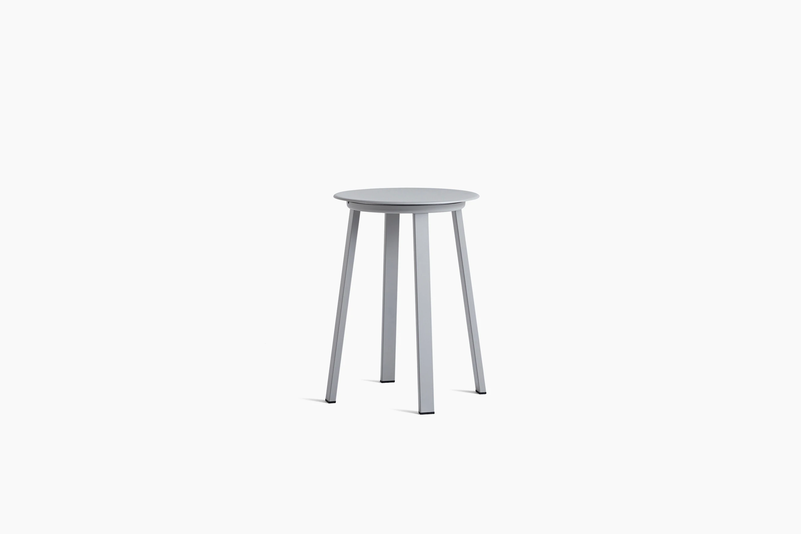 Grey Revolver Stool, viewed at an angle.