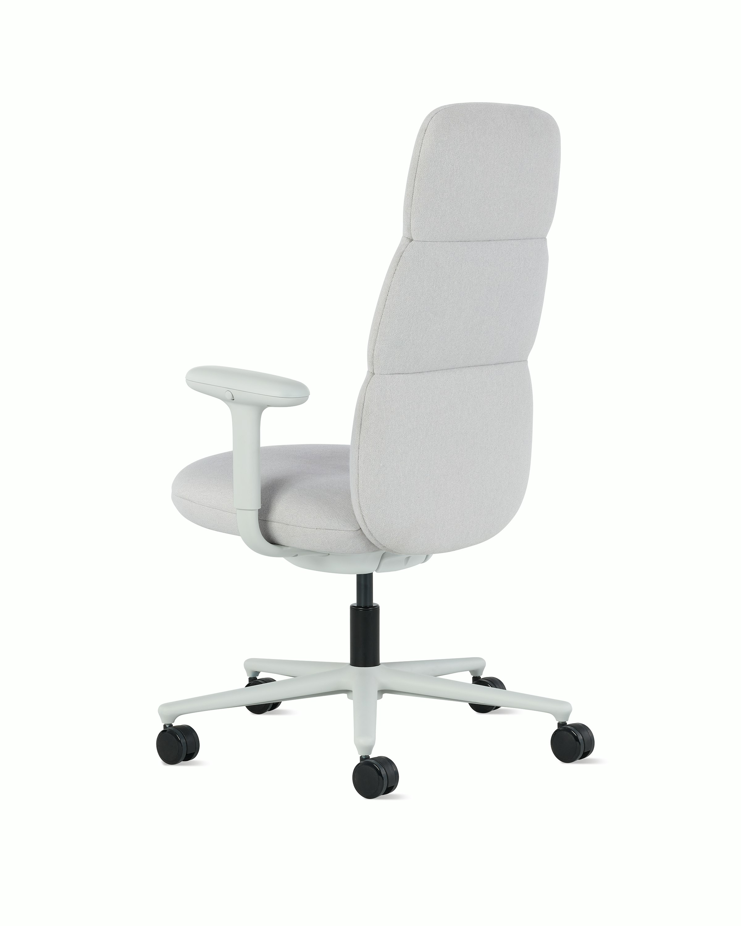 Rear angle view of a high-back Asari chair by Herman Miller in light grey with height adjustable arms.